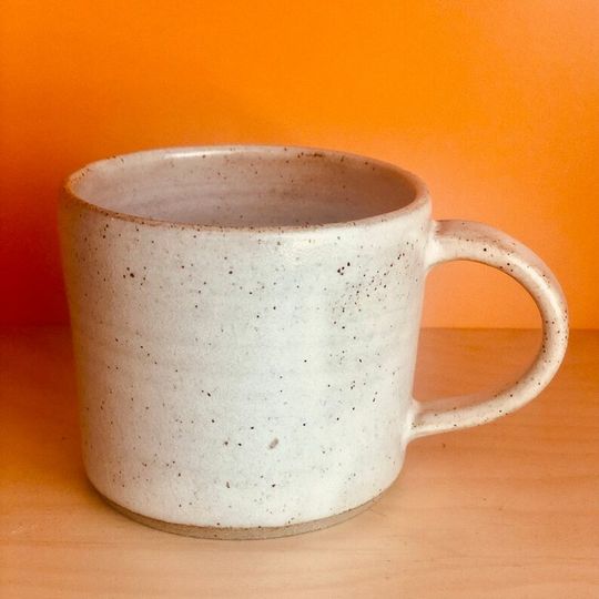 Handmade small cream speckled ceramic coffee mug