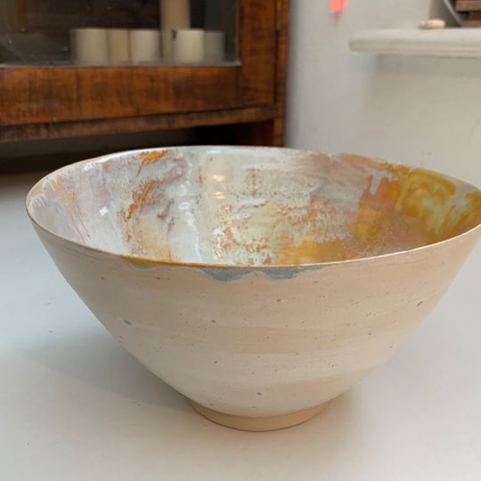 Hand thrown large stoneware serving bowl with a hand painted watercolour internal glaze and a matte white exterior glaze.