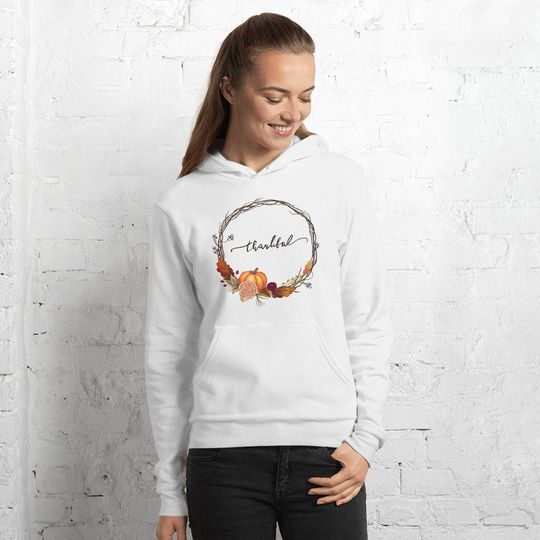 Thanksgiving hoodie with a thanksgiving wreath and orange pumpkin for fall season. Long sleeve thankful hoodie for women unique gift for her